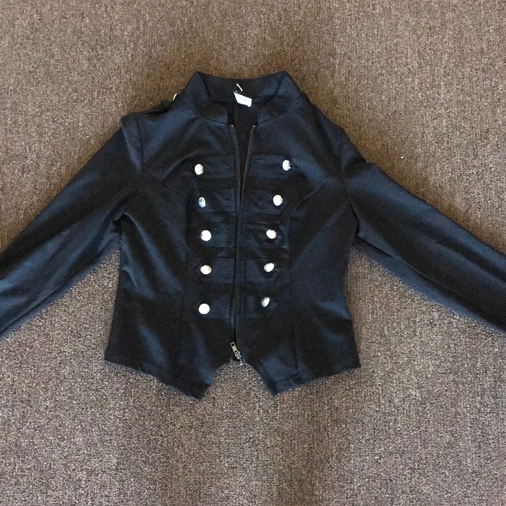 Form fitting black zip up buttoned vest